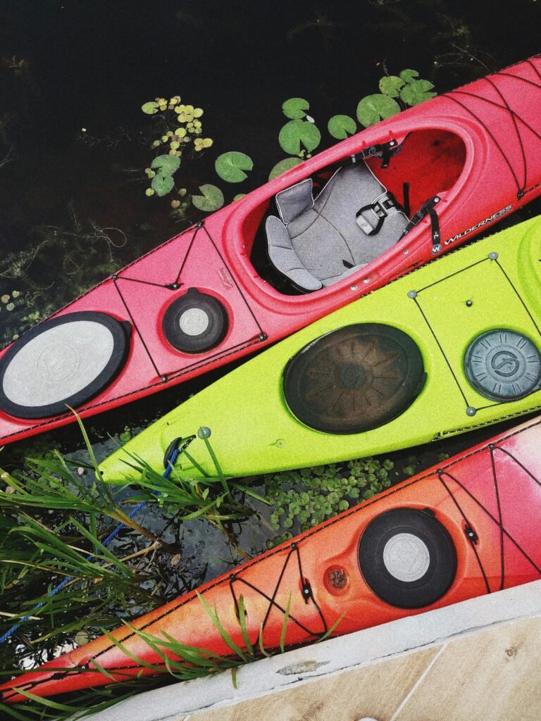 three unmanned kayaks